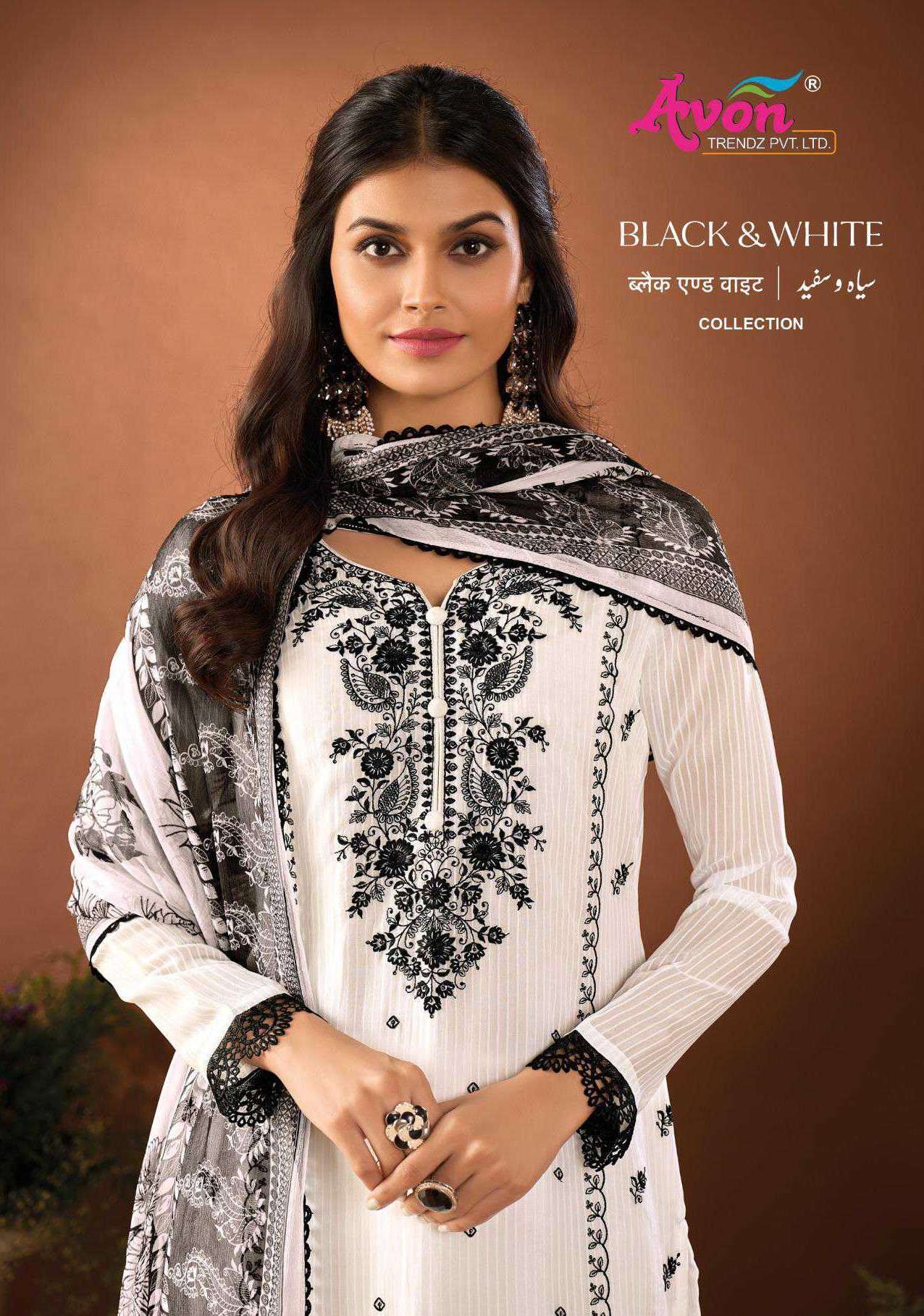 AVON TRENDZ BLACK AND WHITE ORGANZA PATTERN CASUAL WEAR SUIT SUPPLIER IN SURAT 
