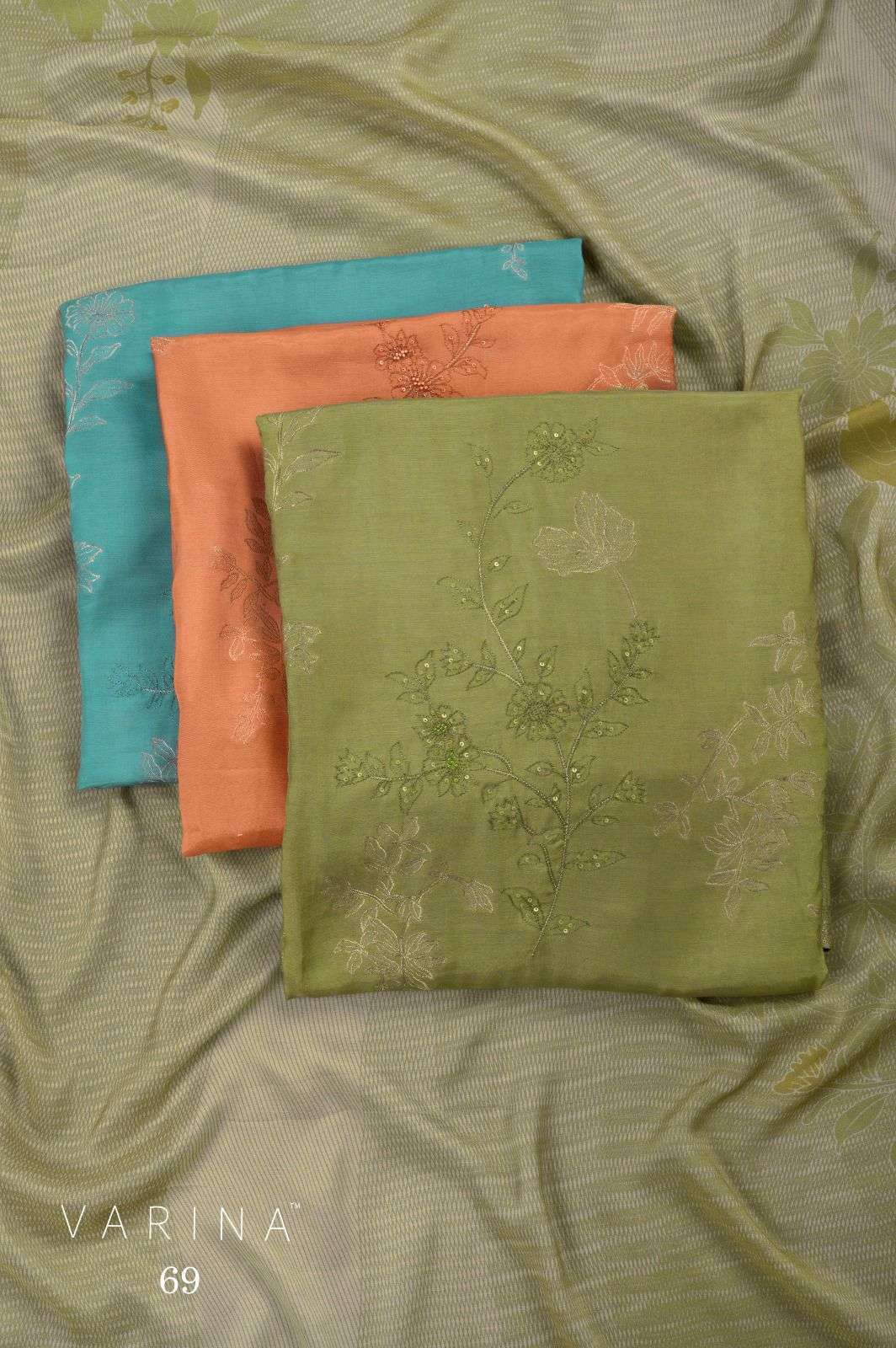 OMTEX 69 MUSLIN JACQUARD HADNWORK SALWER KAMEEZ SUIT WHOLESALER 2026