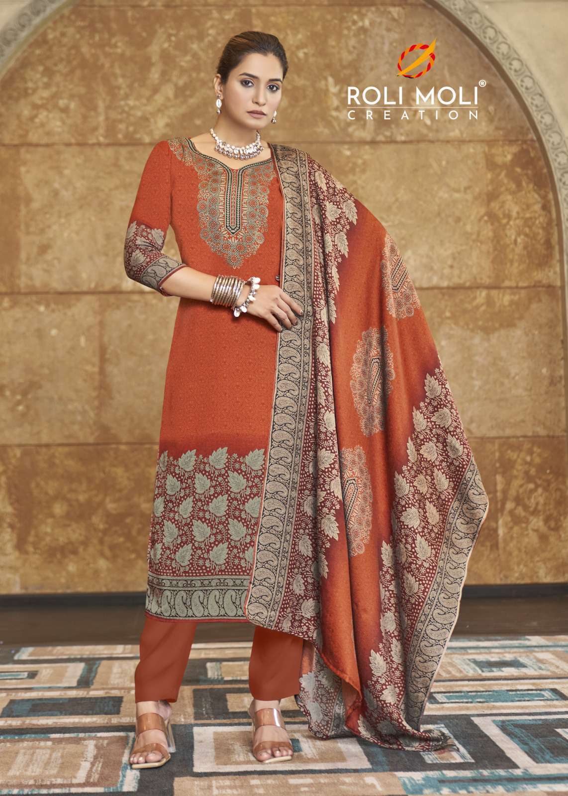 ROLI MOLI FAIZA PRINTED PASHMINA WINTER SUIT CATALOGUE WHOLESALER 2024