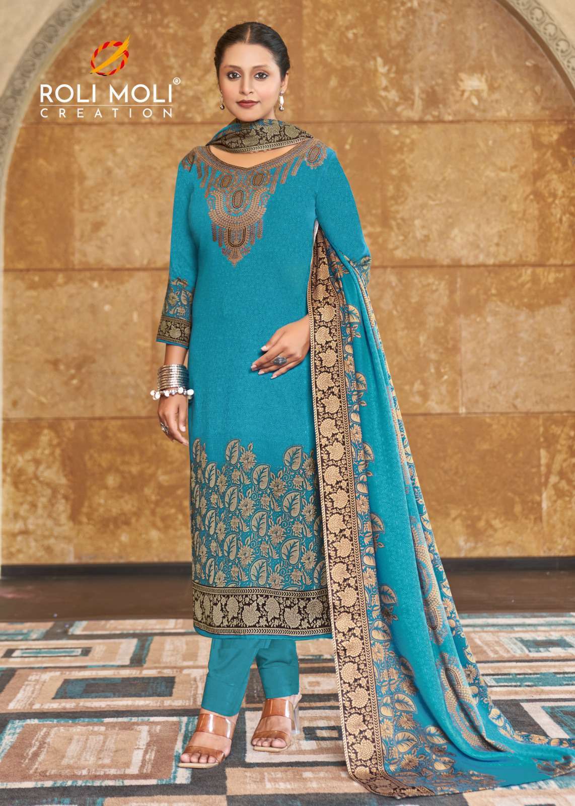 ROLI MOLI FAIZA PRINTED PASHMINA WINTER SUIT CATALOGUE WHOLESALER 2024