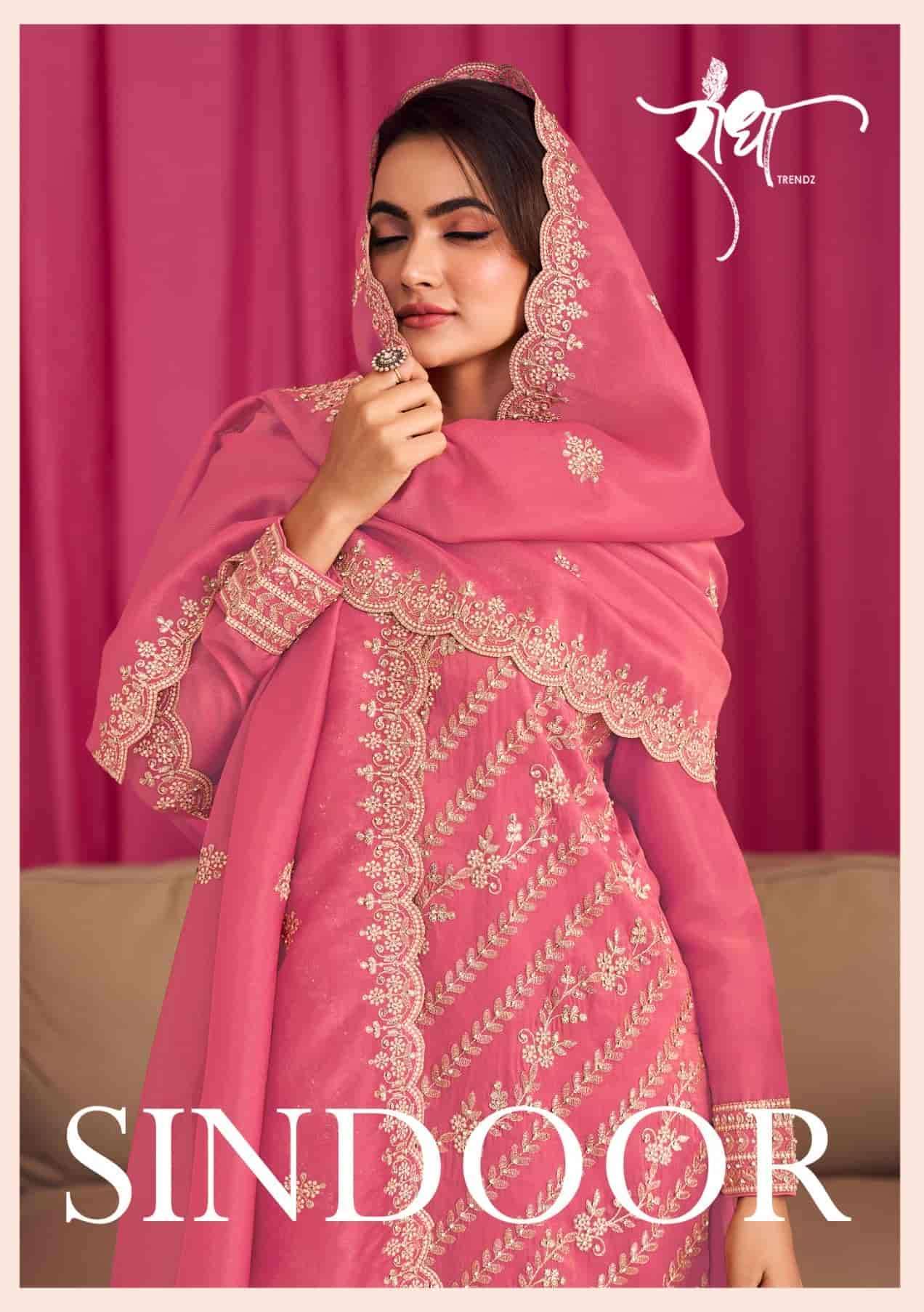 RADHA TRENDZ SINDOOR LATEST DESIGNER SHARARA DRESS CATALOGUE WHOLESALER IN SURAT 