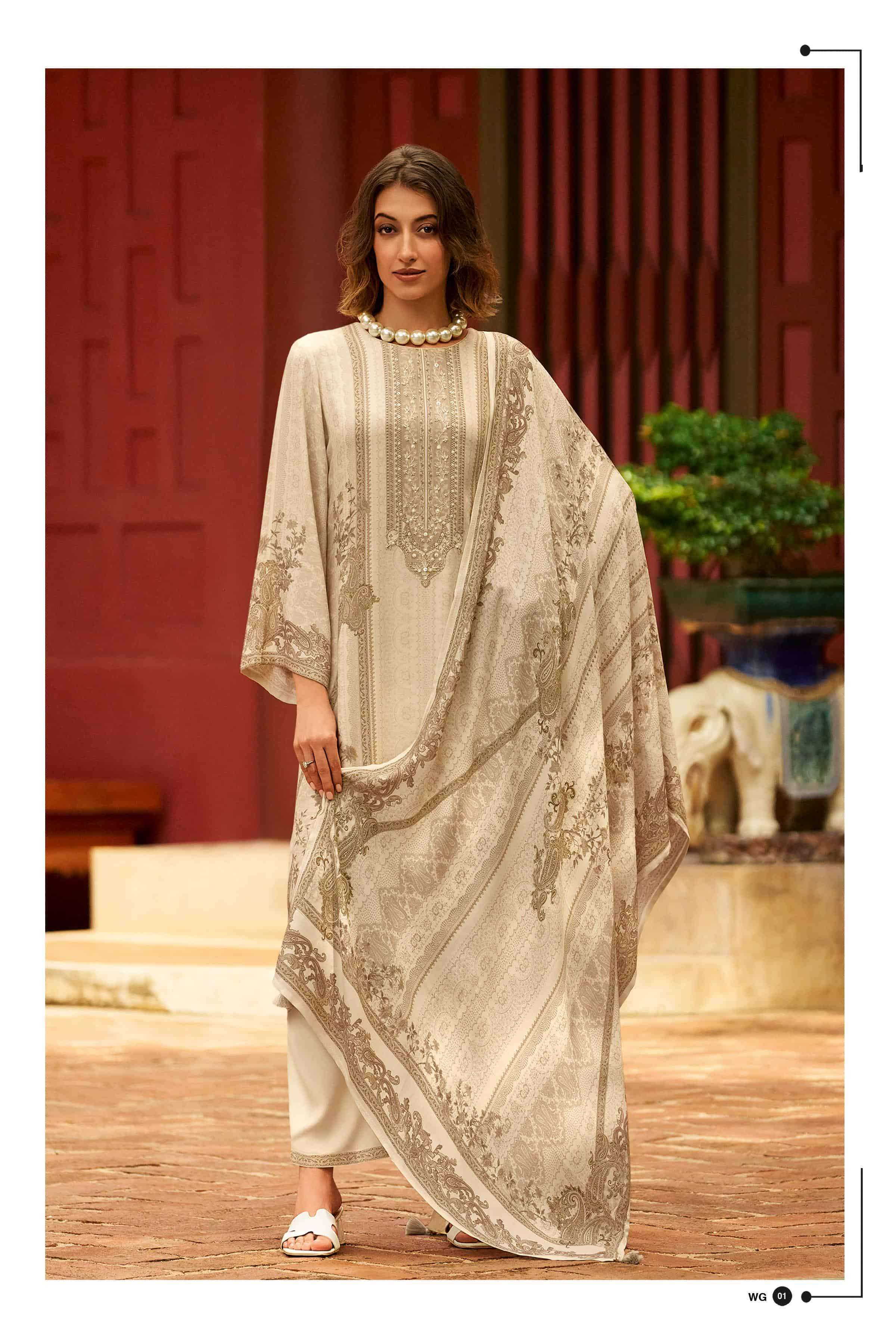 VARSHA WHITE GOLD PASHMINA WINTER SUIT CATALOGUE WHOLESALER IN SURAT 2025