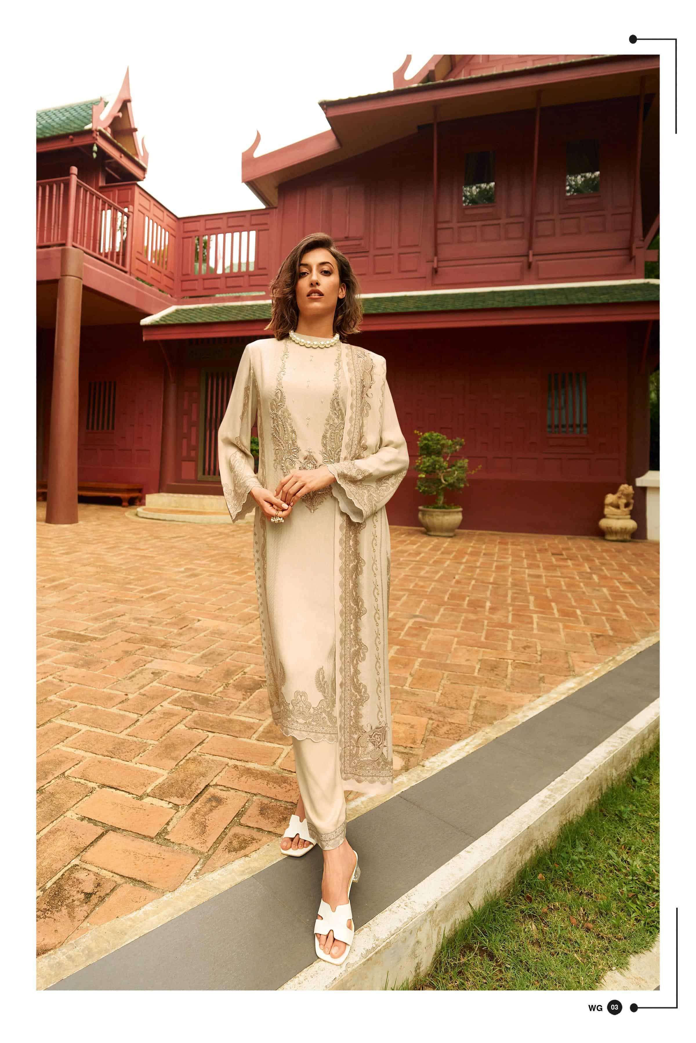 VARSHA WHITE GOLD PASHMINA WINTER SUIT CATALOGUE WHOLESALER IN SURAT 2025